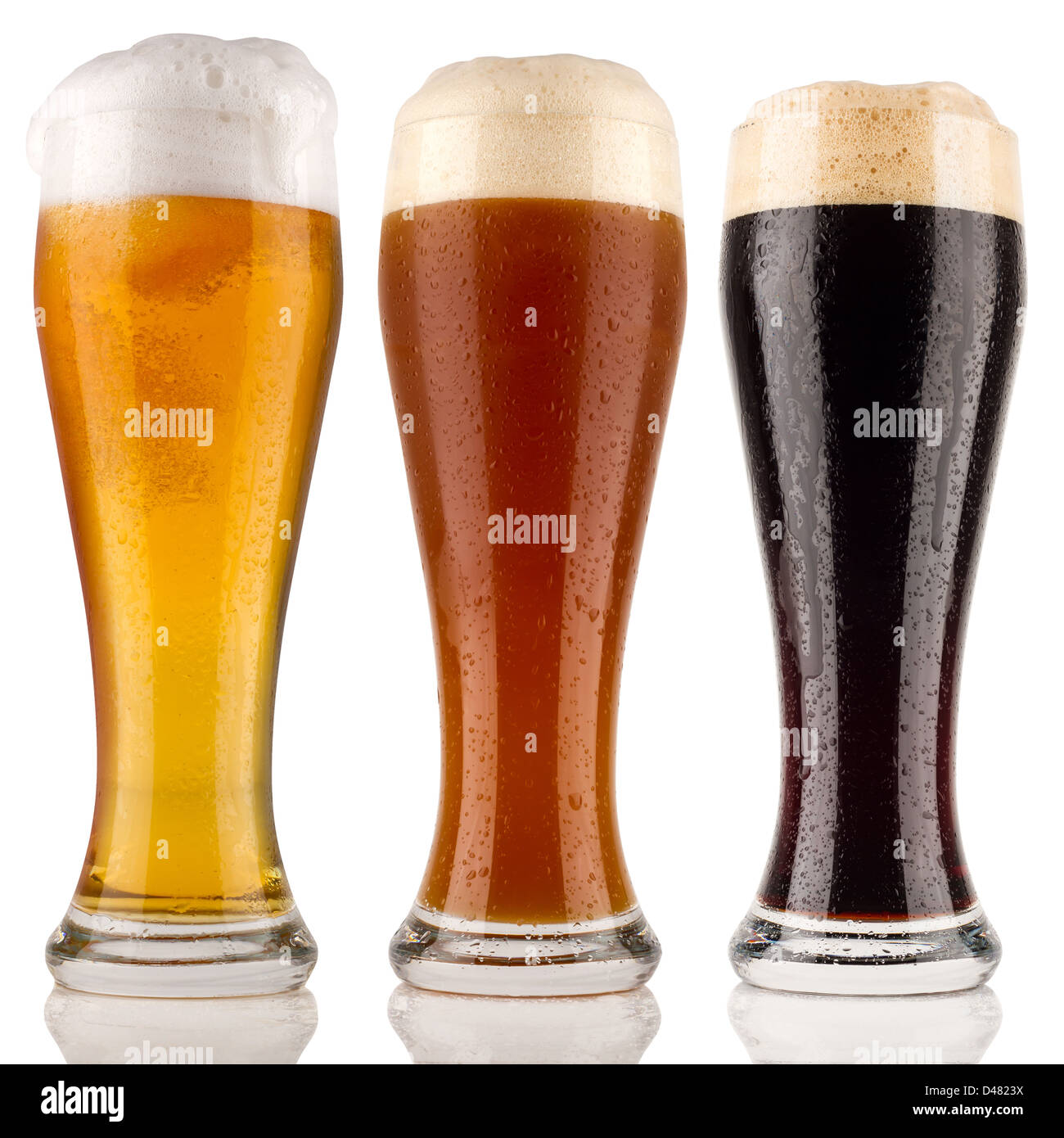 different wheat beer in front of white background Stock Photo Alamy