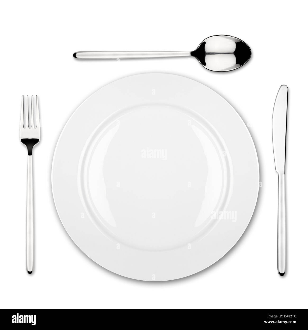 place setting with dish fork,spoon and knife Stock Photo