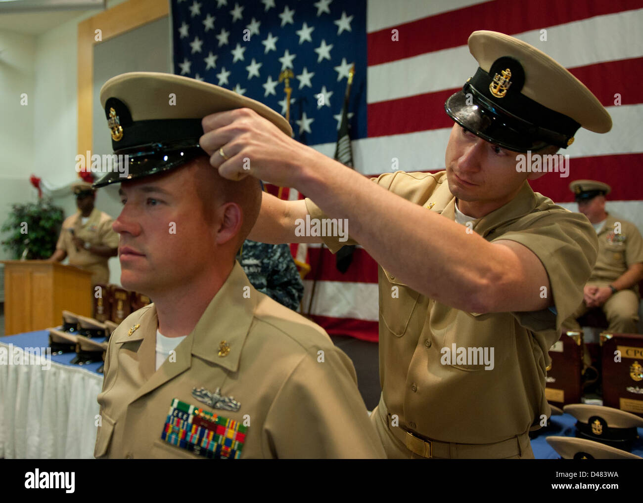 A new chief receives his combination cover Stock Photo Alamy