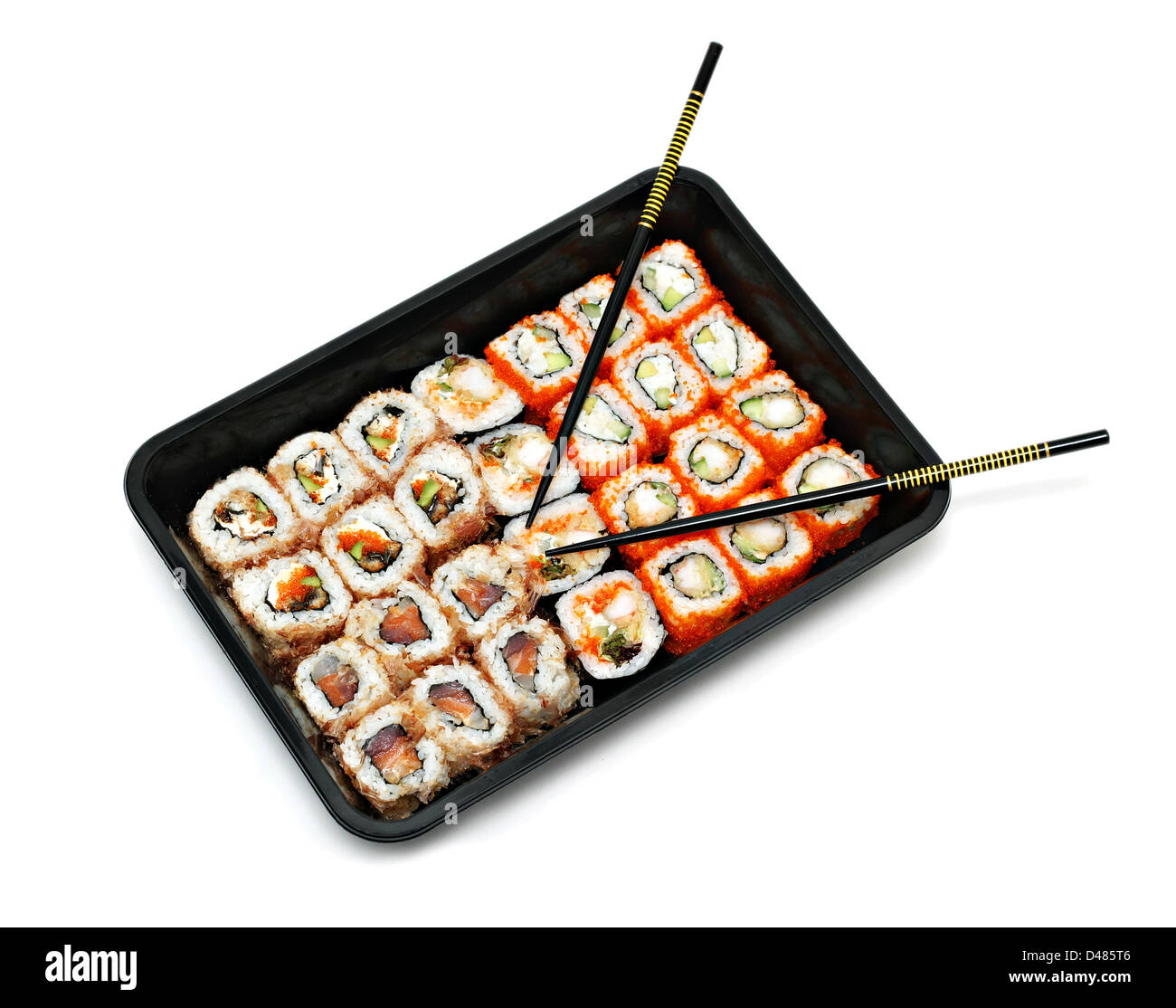 Big colorful sushi set and chopsticks isolated on white Stock Photo