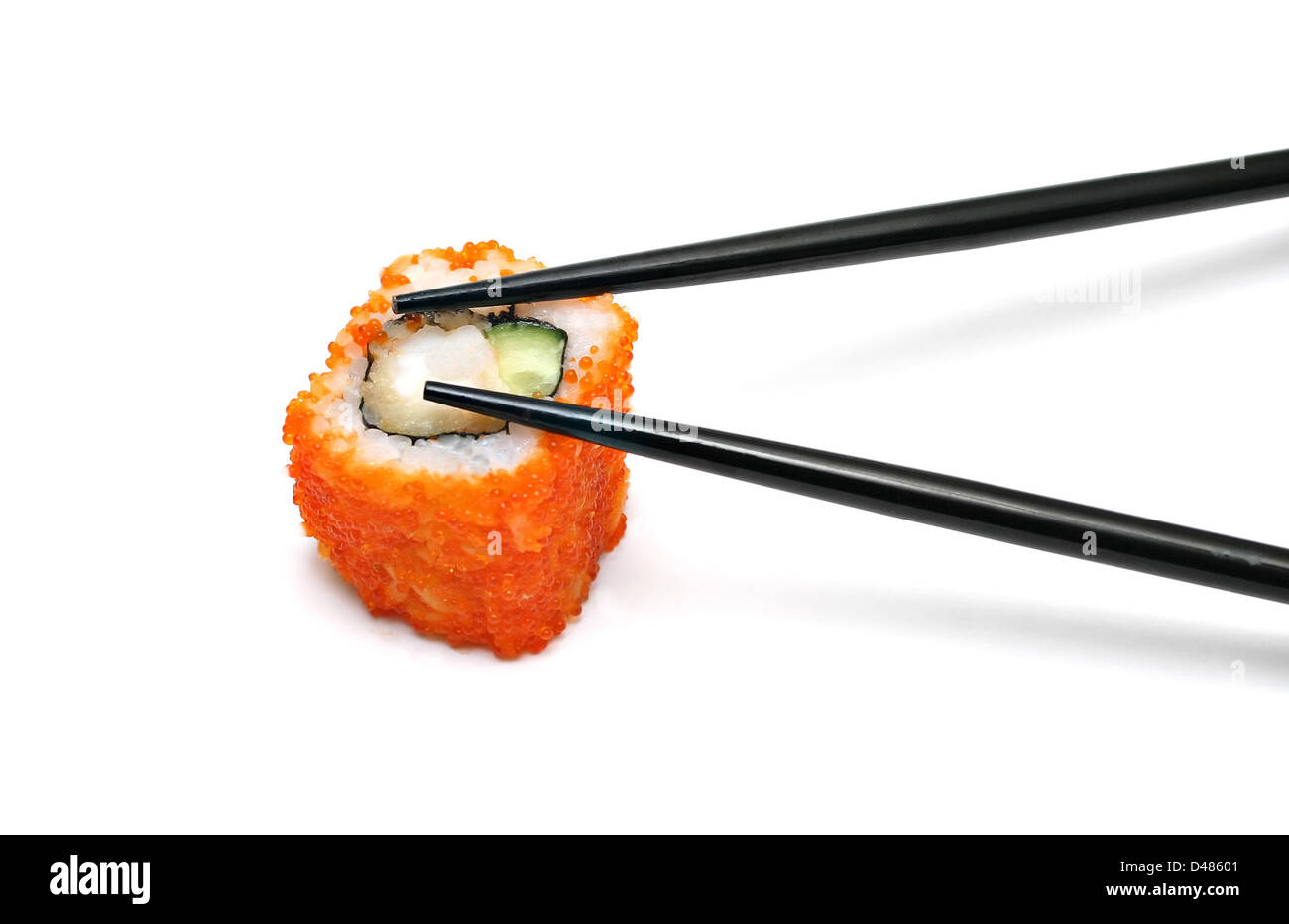 Single japan sushi roll and chopsticks isolated Stock Photo