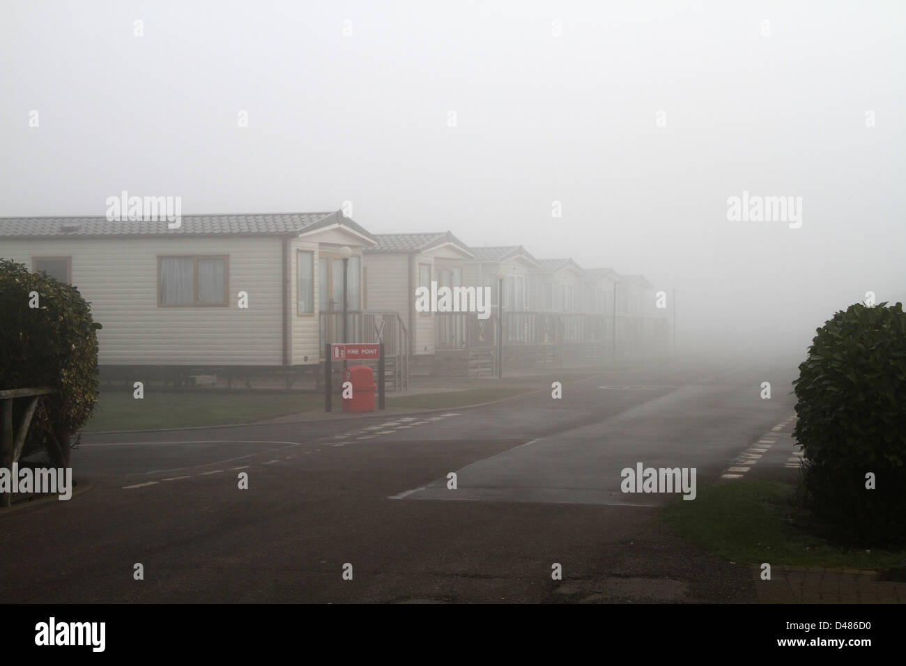 Heavy fog at caravan site. Stock Photo
