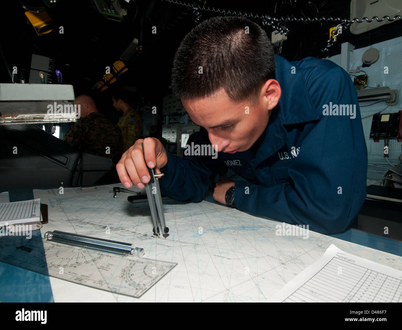 Sailor plots the ship s position Stock Photo Alamy Sailor plots the ship s position Stock Photo Alamy