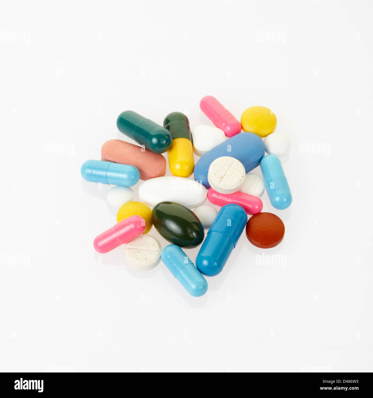 Pills and colorful medical capsules heap Stock Photo