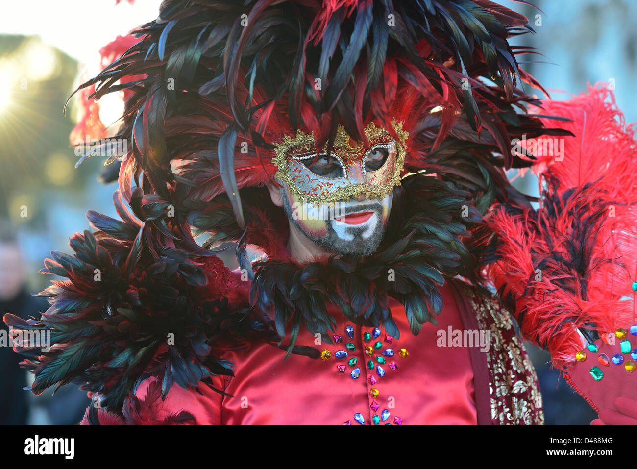 A weird hat and mask at 2013 carnival; note he has contact lenses; Venice, Veneto. Italy Stock Photo