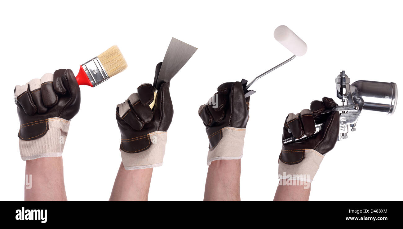 hands with different tools in gloves Stock Photo