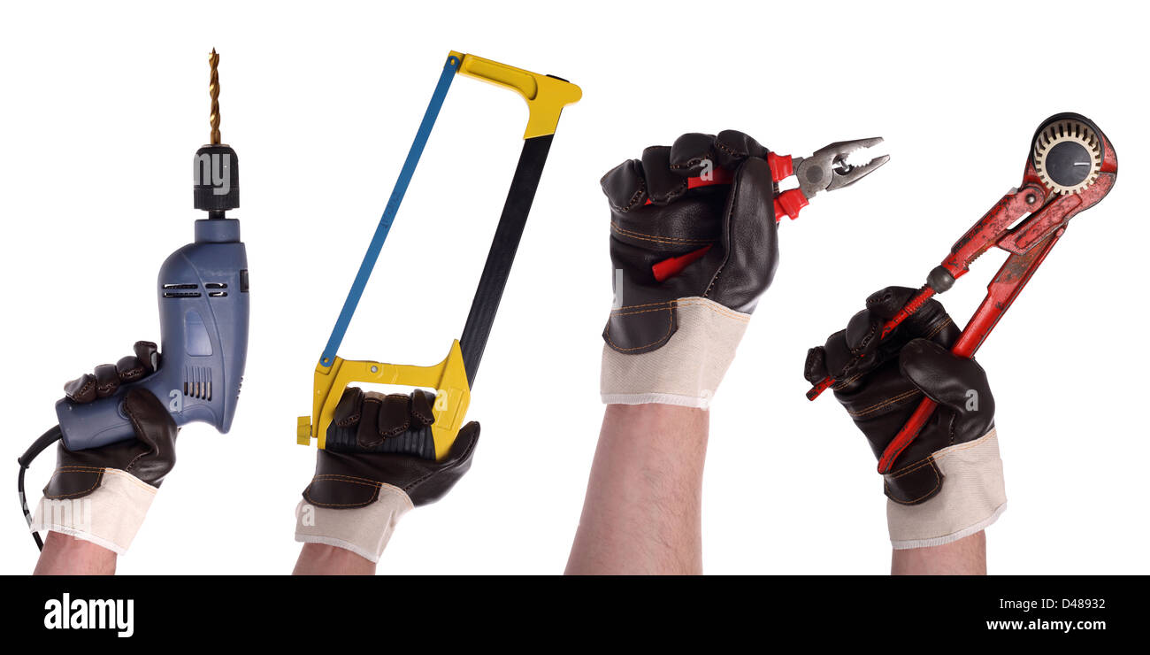 hands with different tools in gloves Stock Photo
