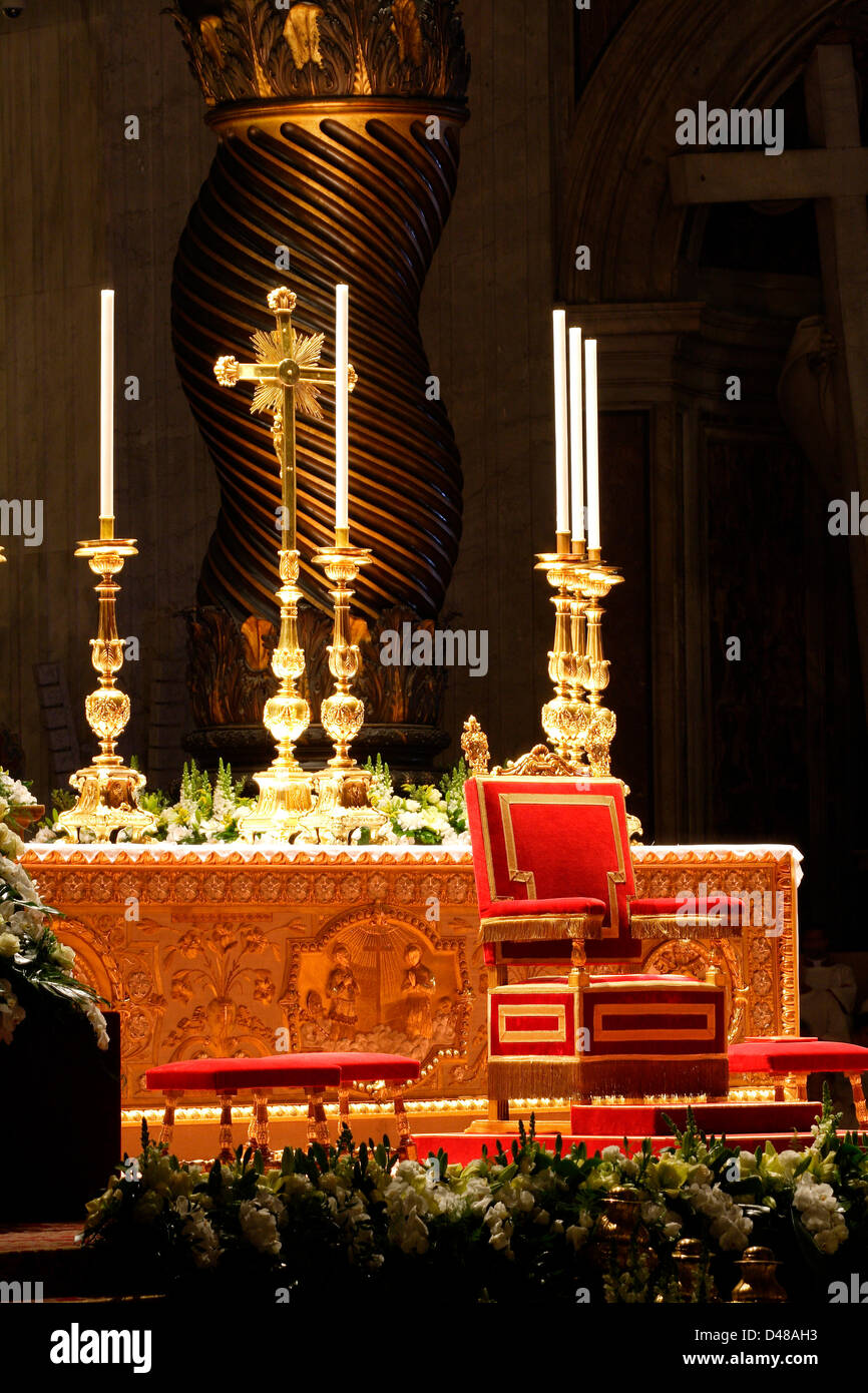Abandonned throne of the Pope in the St. Peter's Basilica in Rome some minutes before the beginning of the celebrations of the Easter Vigil mass in 2012 which was the last Easter Vigil with Joseph Ratzinger as Pope Benedict XVI. Stock Photo