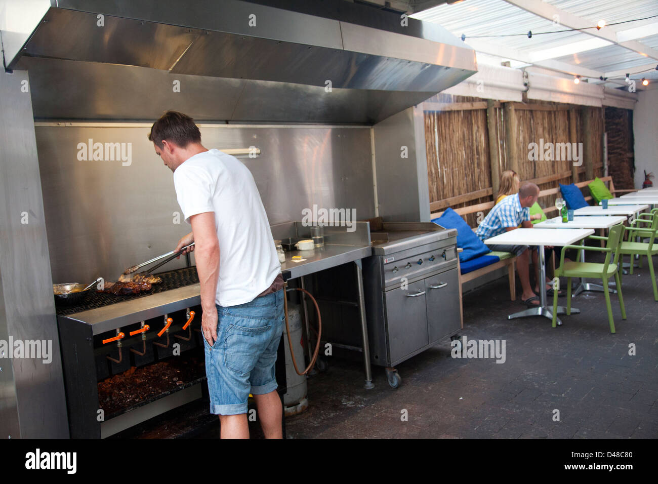 Grilling Meat At Backyard Restaurant In Sea Point Cape Town