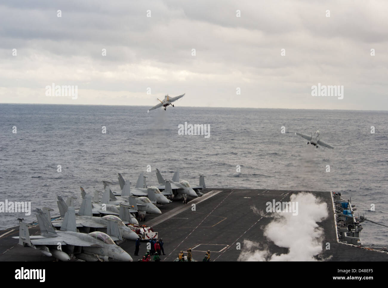 Two F/A-18C Hornets Launch From USS Harry S. Truman Stock Photo - Alamy