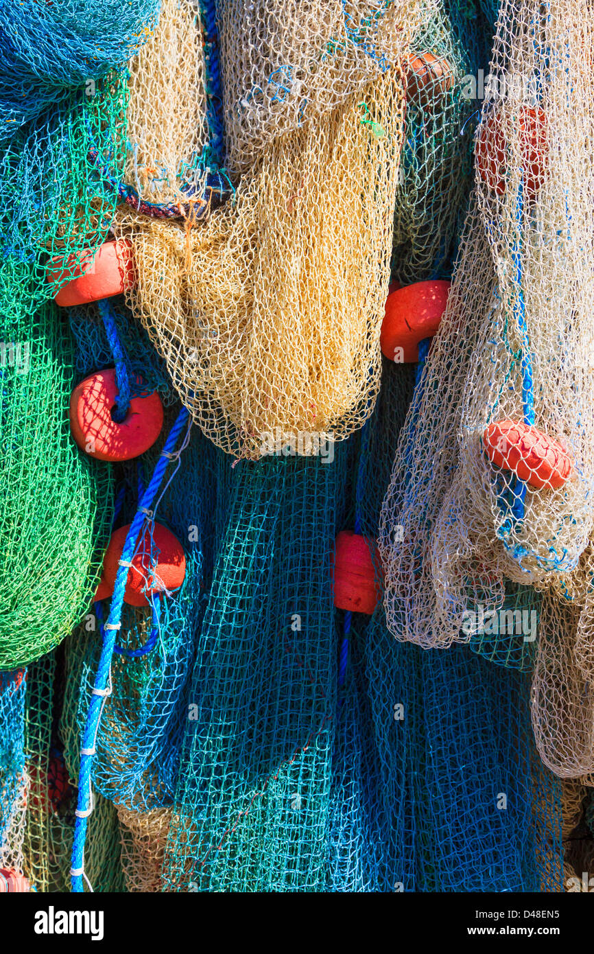 Nylon fishing net with float line attached to small plastic floats Stock  Photo - Alamy