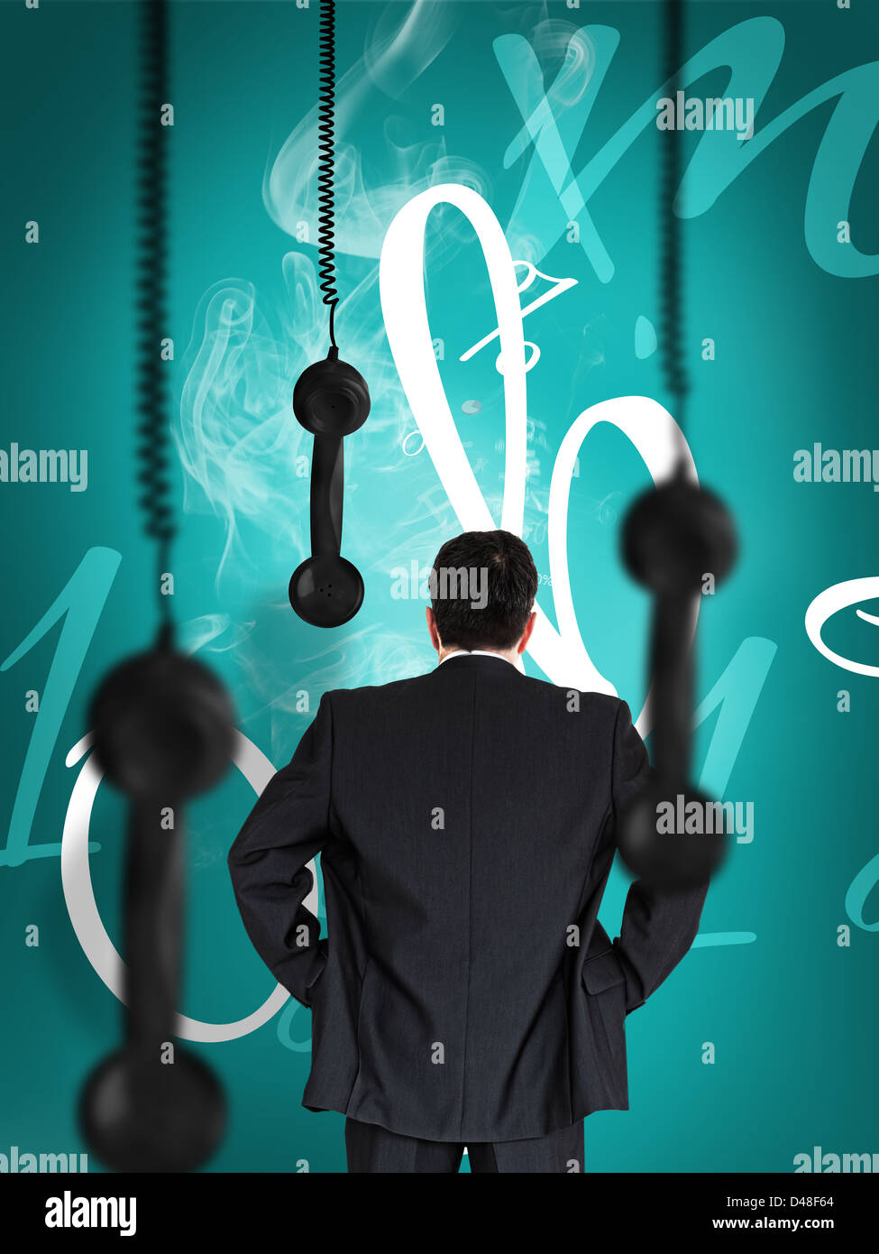 Businessman looking at hanging black telephone receiver Stock Photo