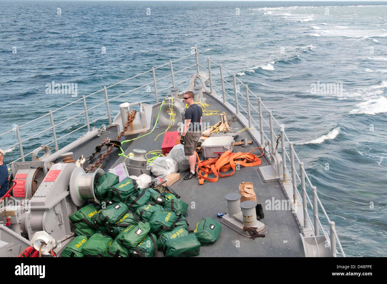 Equipment and material is transferred from USS Guardian. Stock Photo