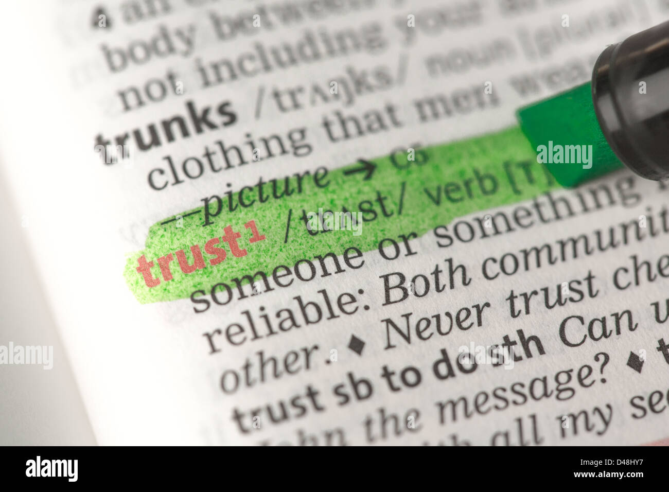 Trust definition highlighted in green Stock Photo