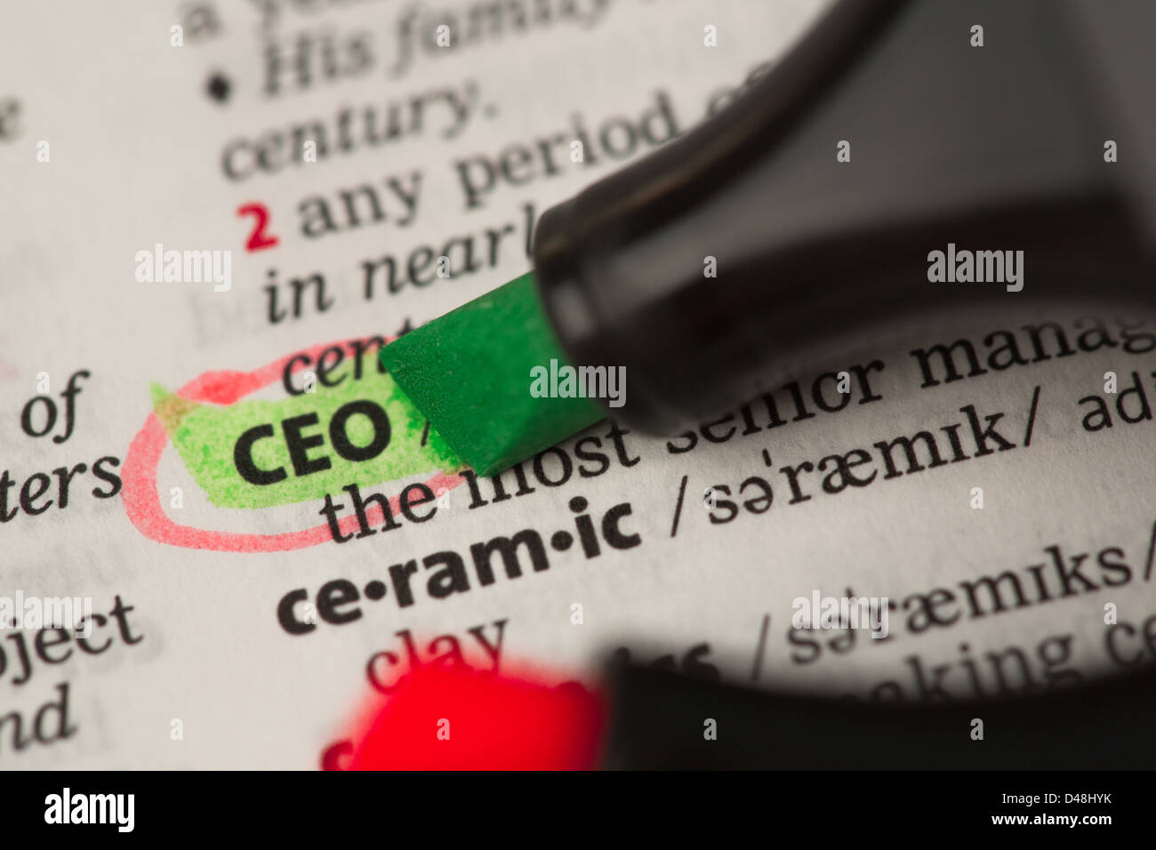 ceo-definition-highlighted-and-circled-in-the-dictionary-stock-photo