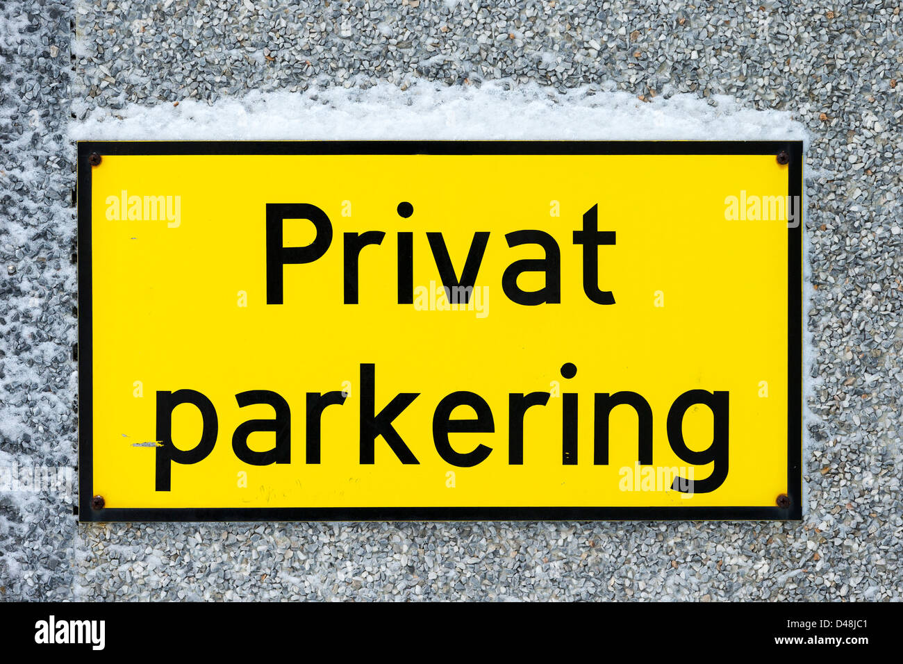 Sign in Norwegian saying 'Privat parkering' - private parking. Stock Photo