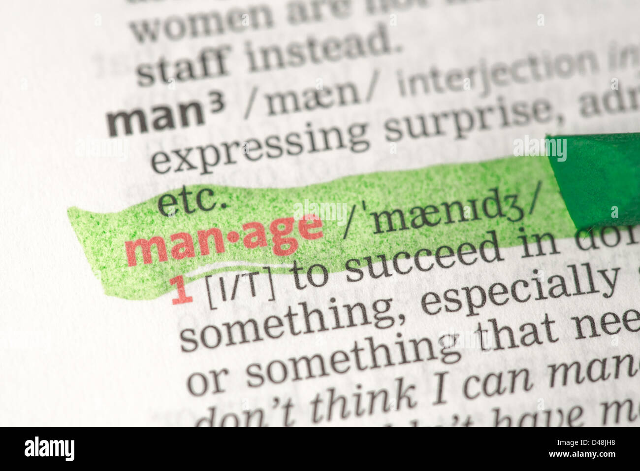 Manage definition highlighted in green Stock Photo