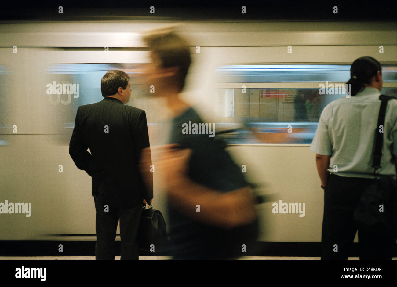Commuters on underground, London, UK Stock Photo