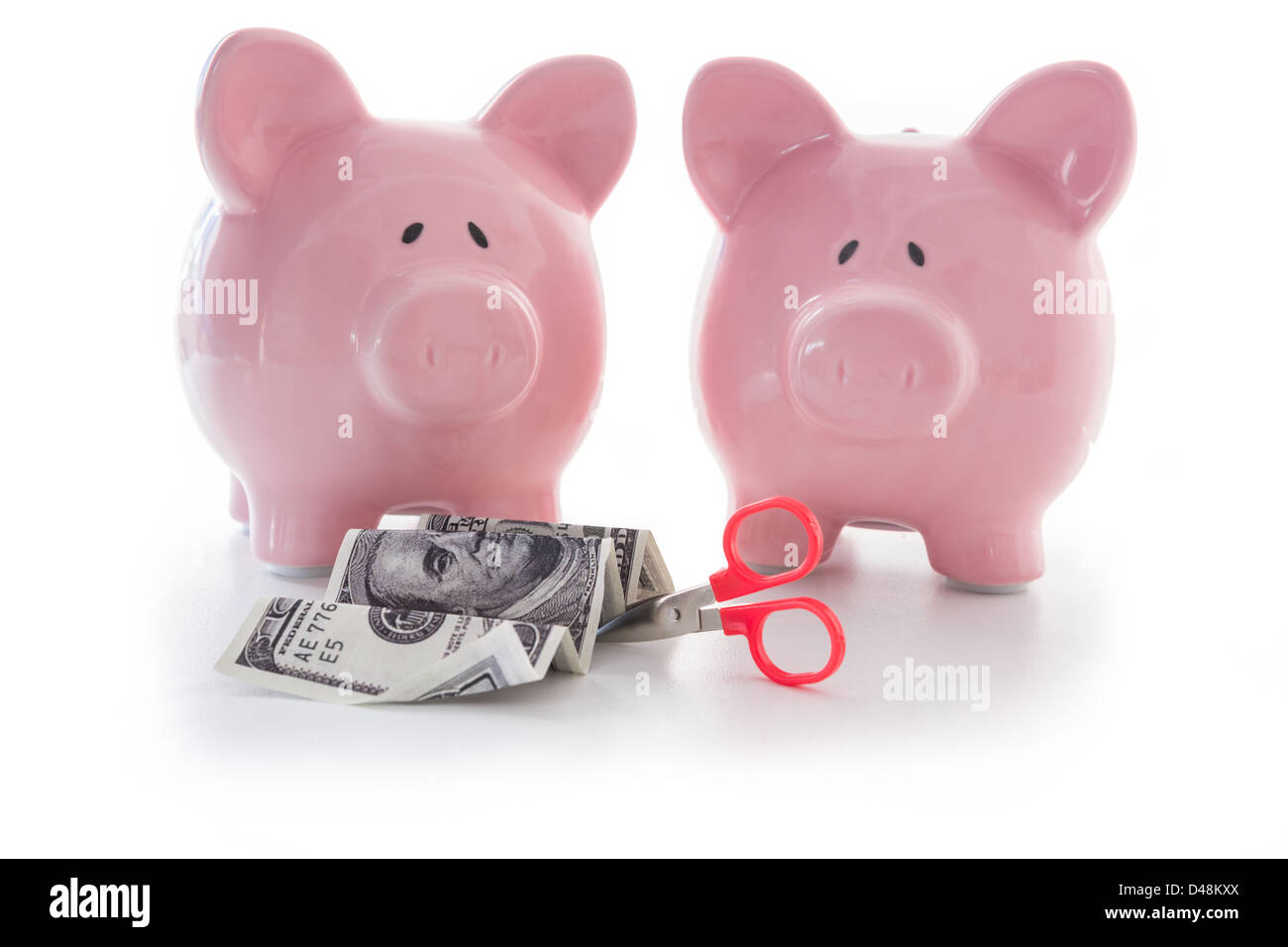 Cutting costs concept Stock Photo