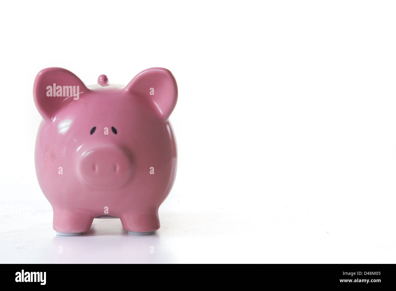 Pink ceramic piggy bank Stock Photo - Alamy