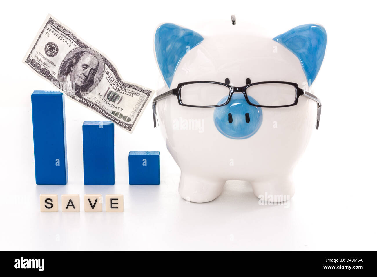 Piggy bank wearing glasses with save message Stock Photo - Alamy