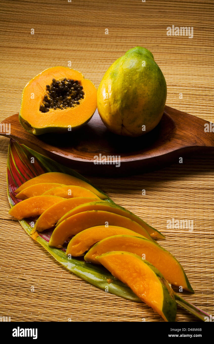 Studio Shot Of Papaya, Whole And In Slices. Stock Photo