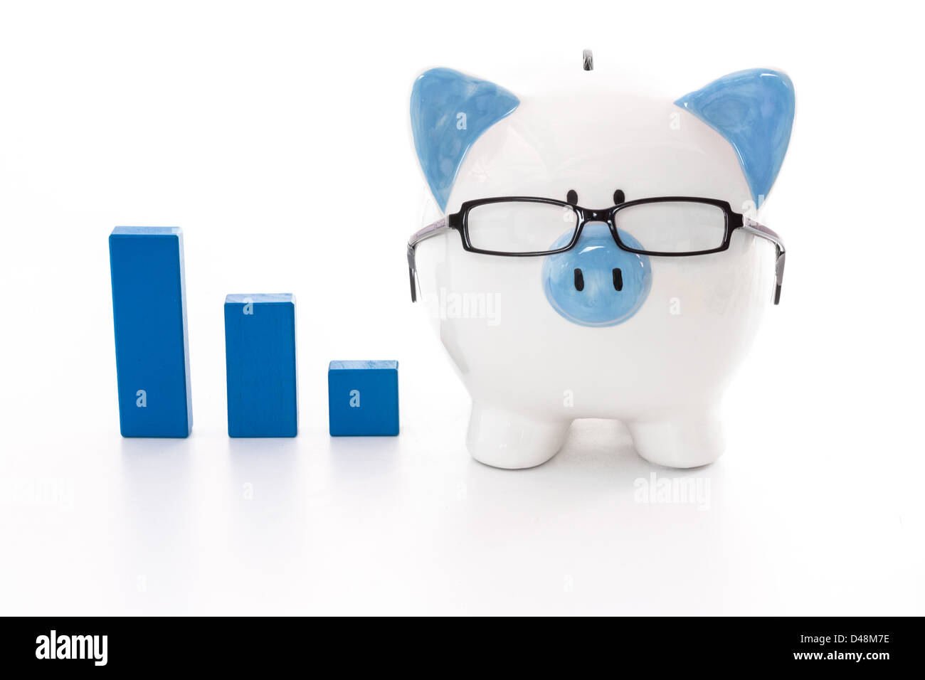 Piggy bank wearing glasses with blue graph model Stock Photo - Alamy