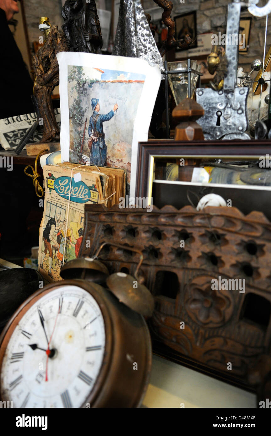 M. Terruel's brocante shop selling  bric-a-brac and antiques. A treasure trove in the heart of the medieval city of Cordes. Stock Photo