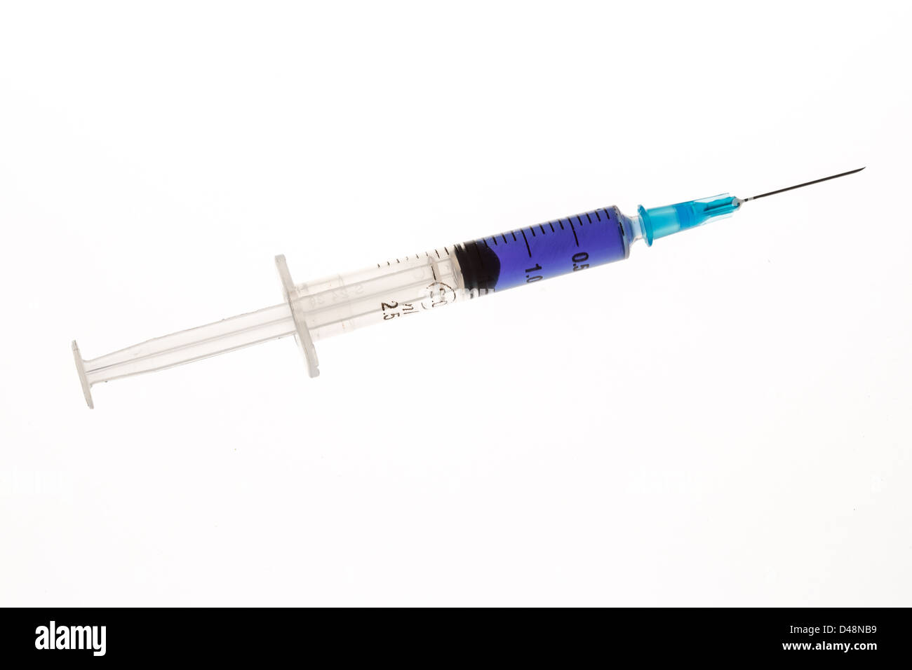 Hypodermic needle with purple liquid Stock Photo
