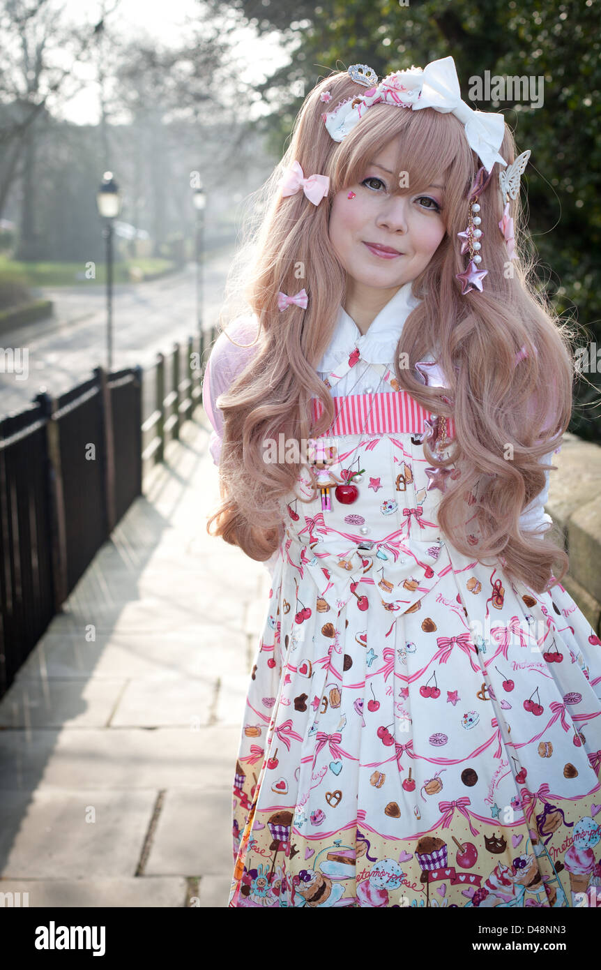 Female model in Cosplay Lolita Clothes outdoors Stock Photo