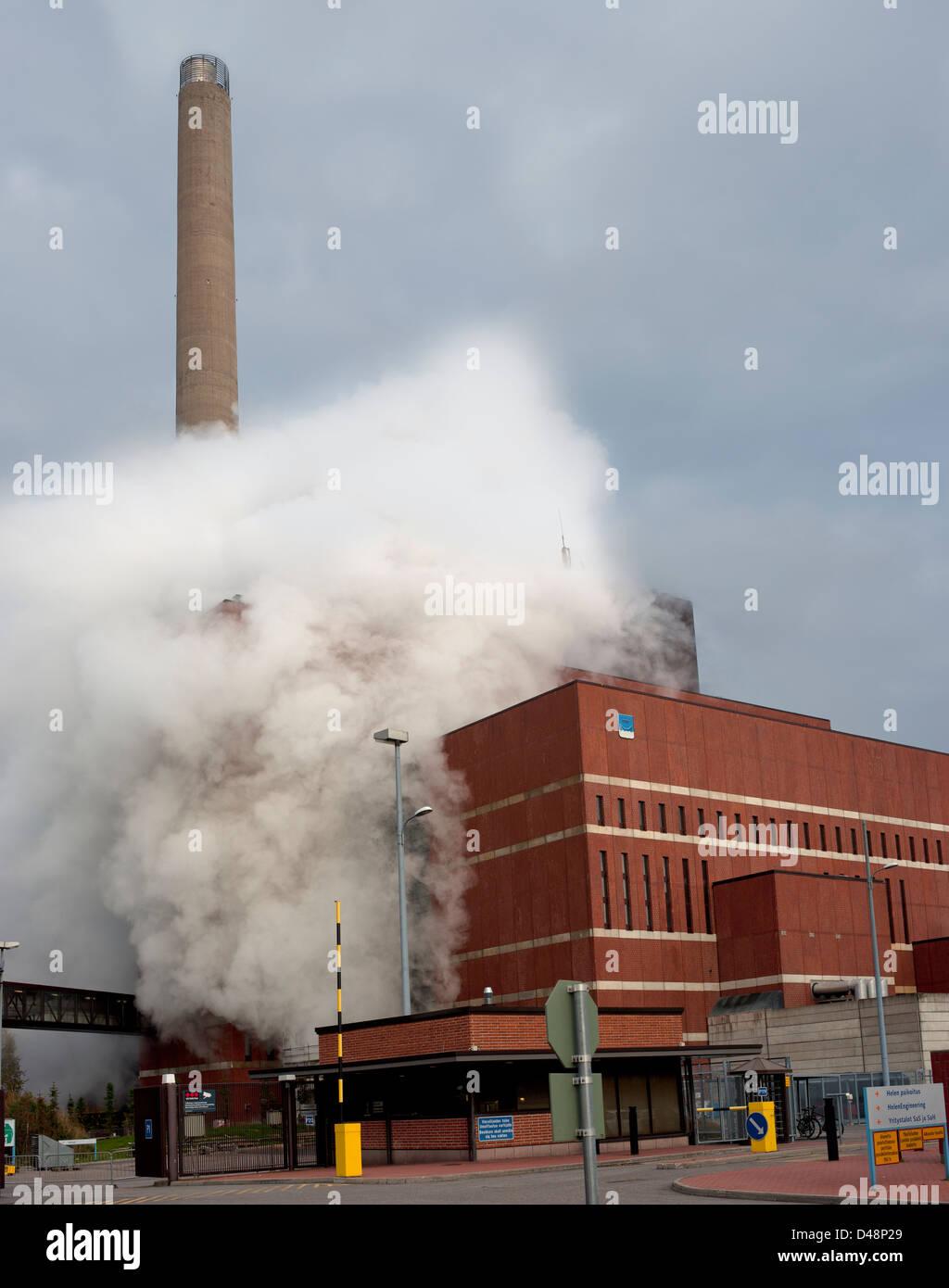 Smoke rising from the factory of Helsingin Energia in Helsinki, Finland Stock Photo