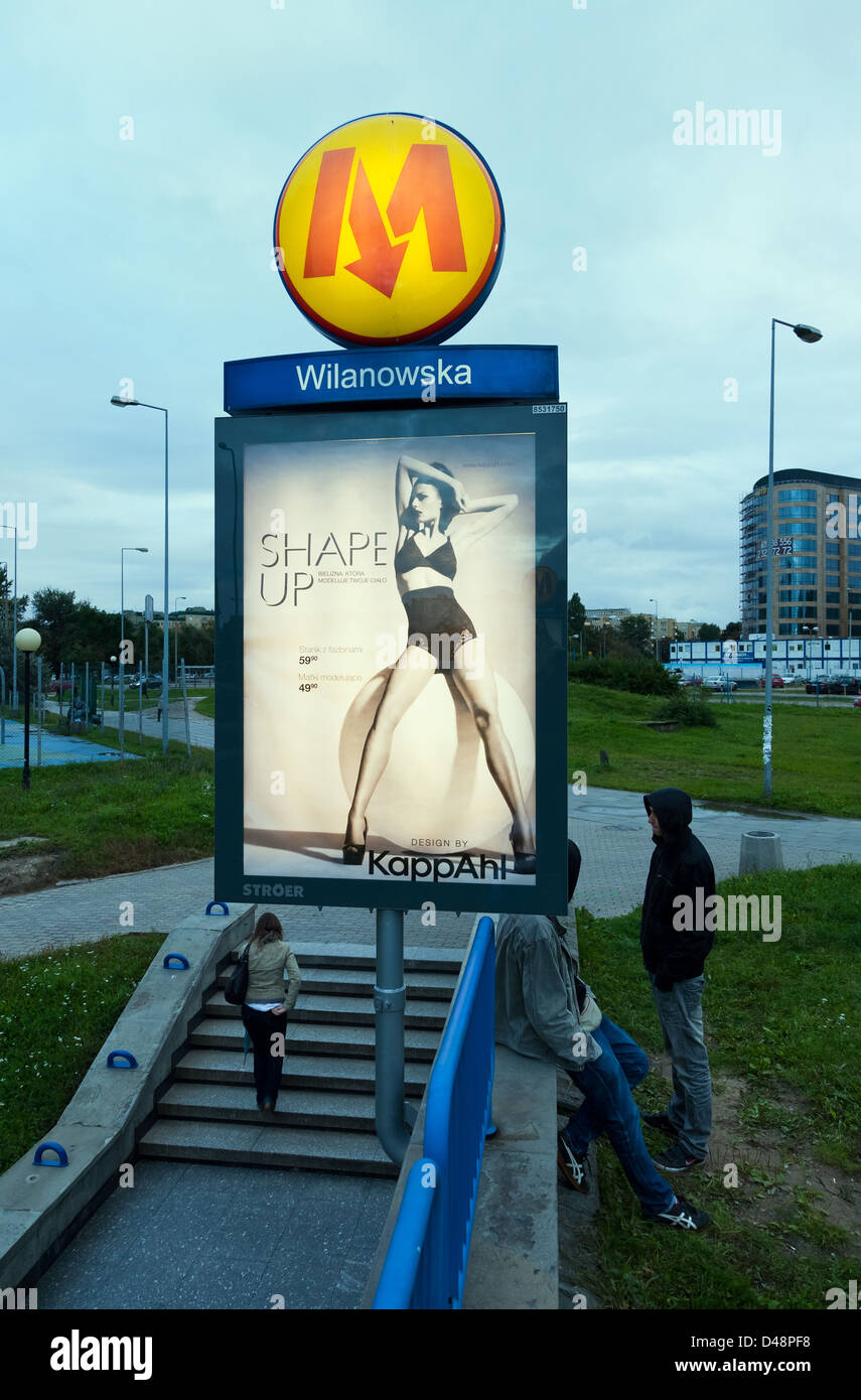 Warsaw, Poland, the entrance to the metro station Wilanowska with billboard Stock Photo