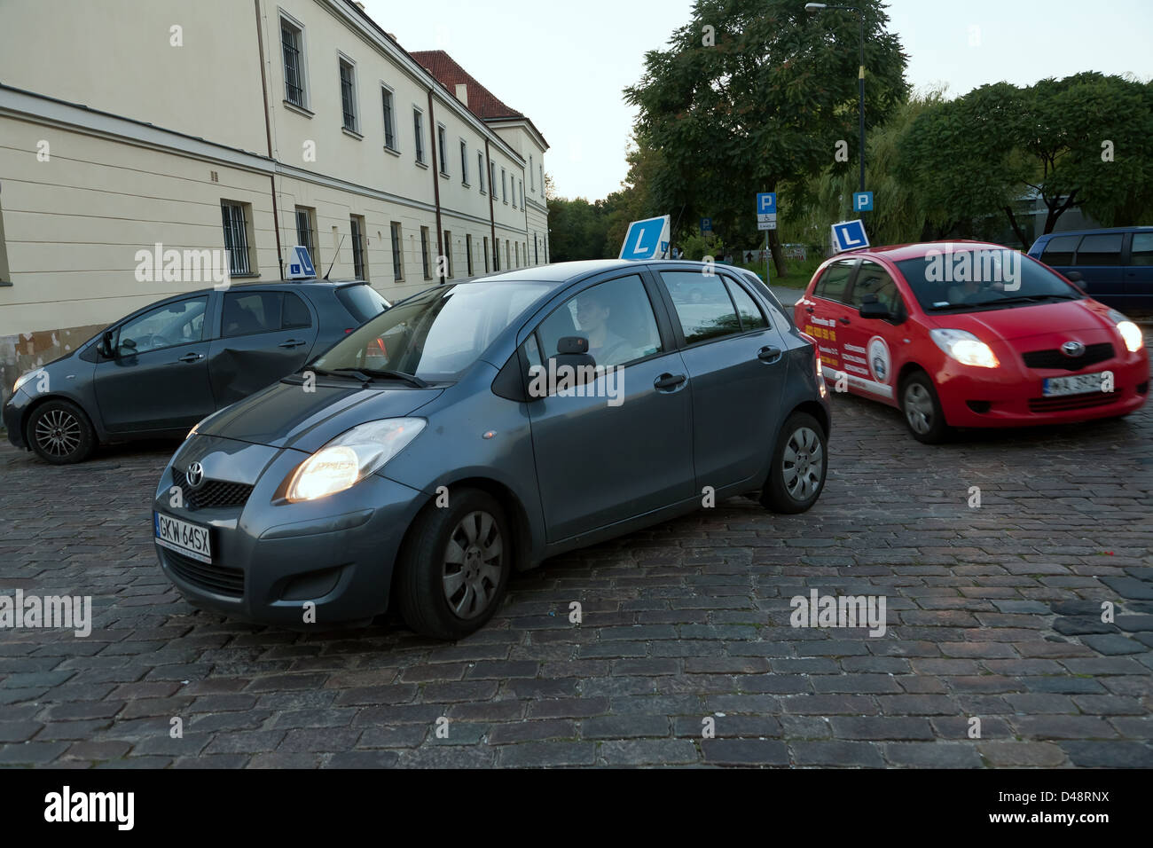 Warsaw, Poland, a driving school cars on the road at night Stock Photo