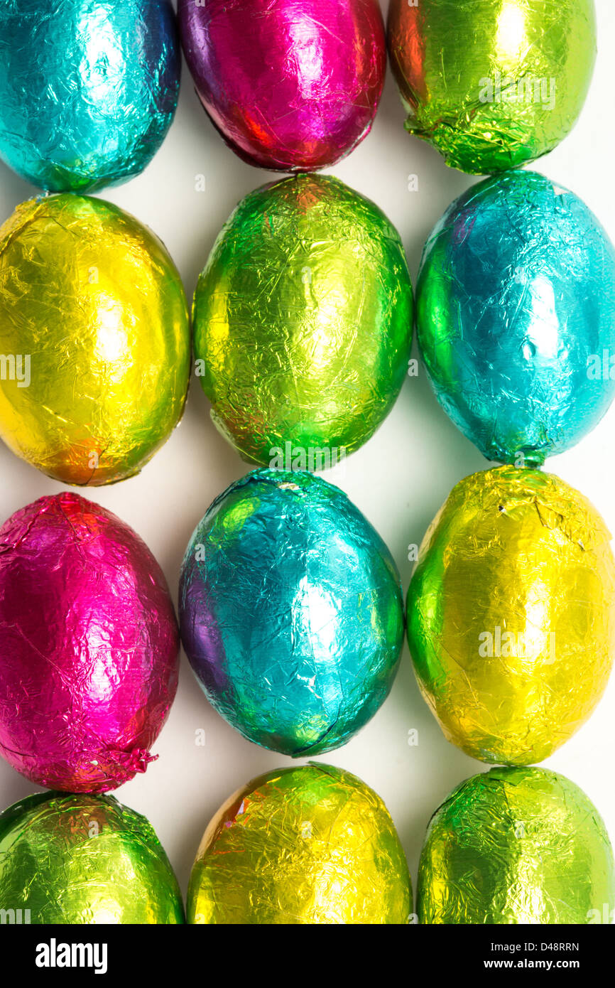 Colourful foil wrapped easter eggs overhead shot Stock Photo Alamy