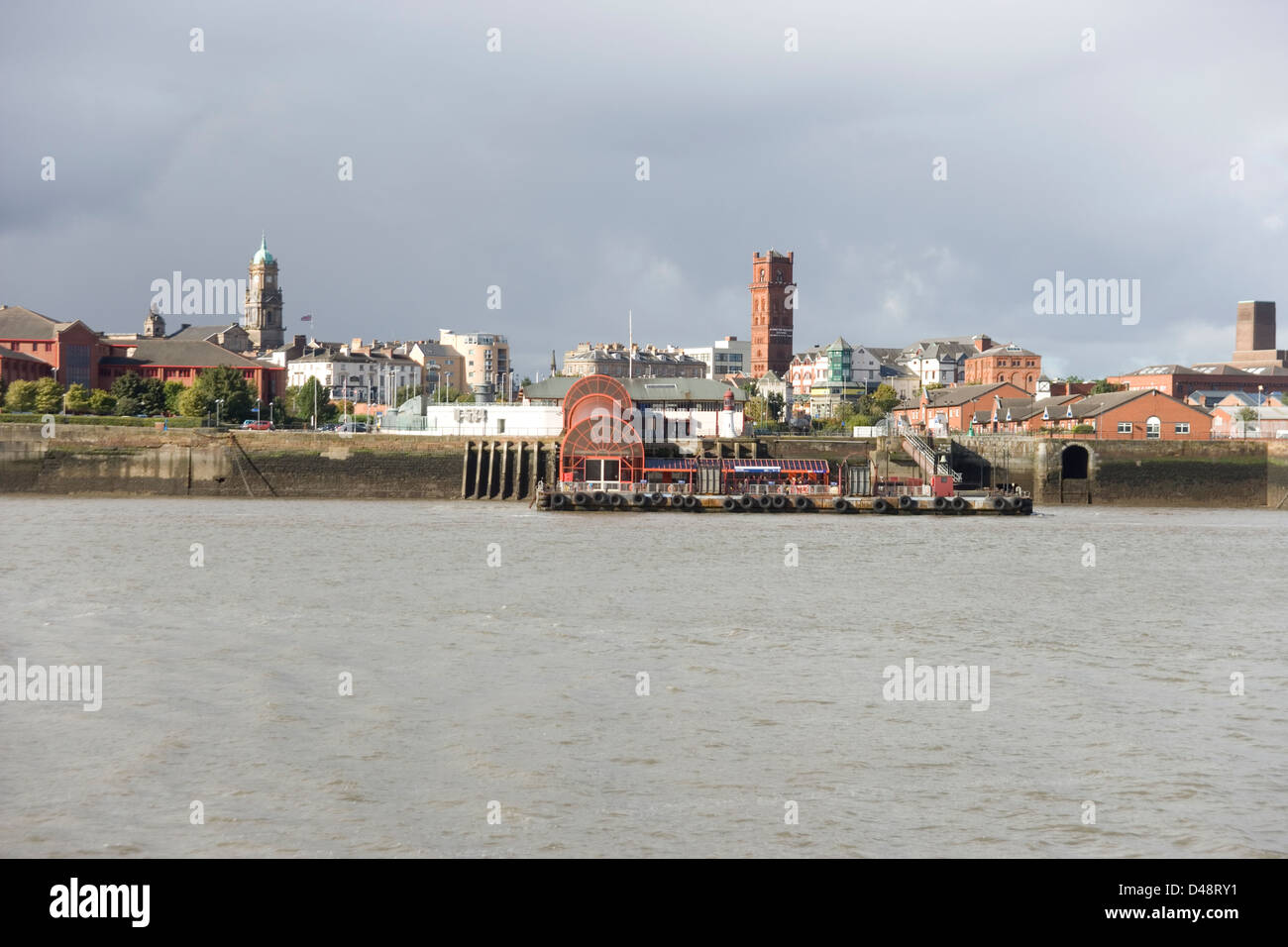 Woodside Foot Ferry terminal and Birkenhead and Mersey River from the Mersey Ferry Stock Photo