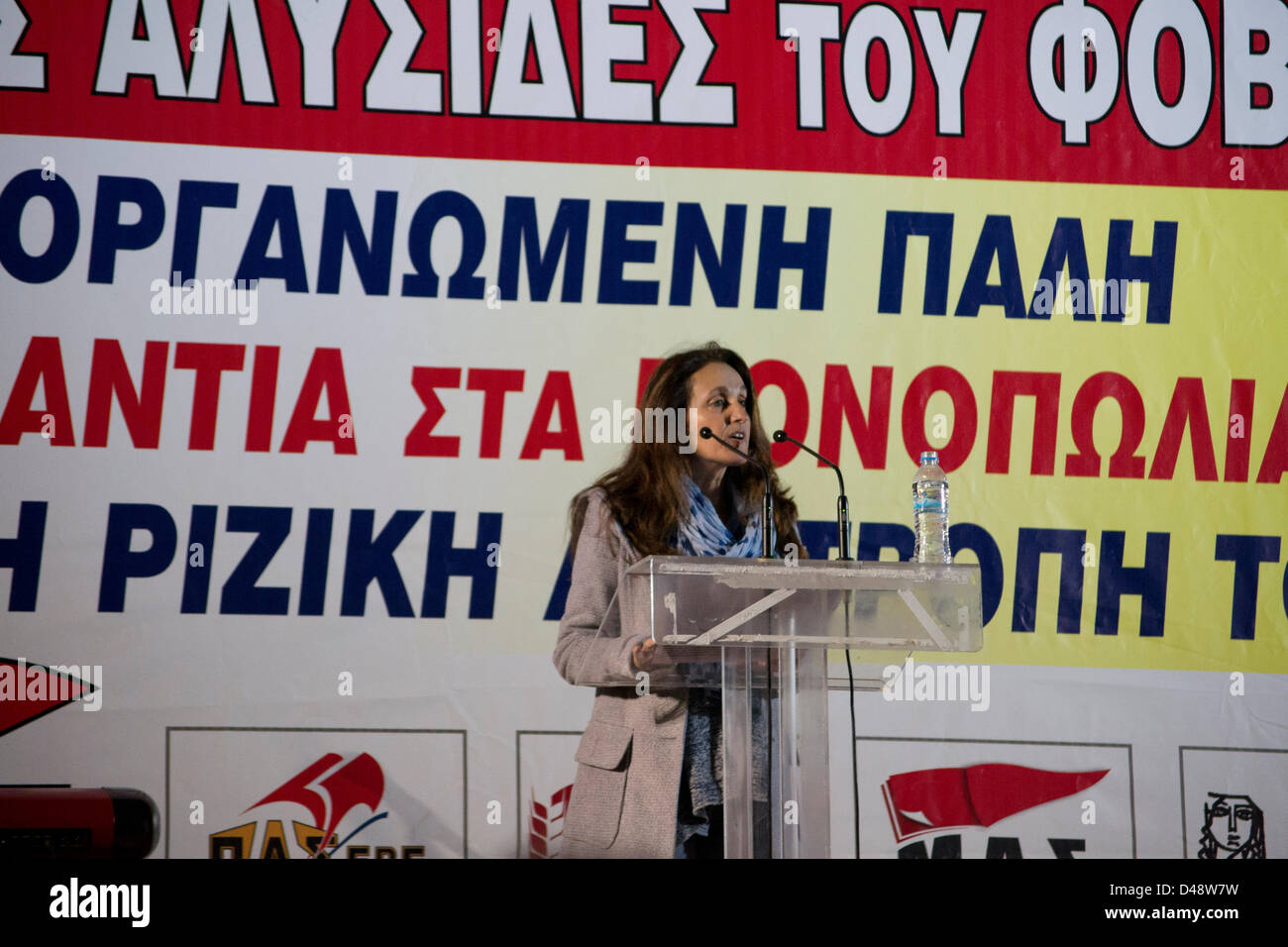 Athens, Greece, 8th March 2013. International women's day is celebrated in Athens with a demonstration against women's working rights abuse. Members and supporters of the Greek Communist Party held banners and shouted slogans against capitalism and government's policies. MP Mrs Mpalou addresses women. Credit:  Nikolas Georgiou / Alamy Live News Stock Photo