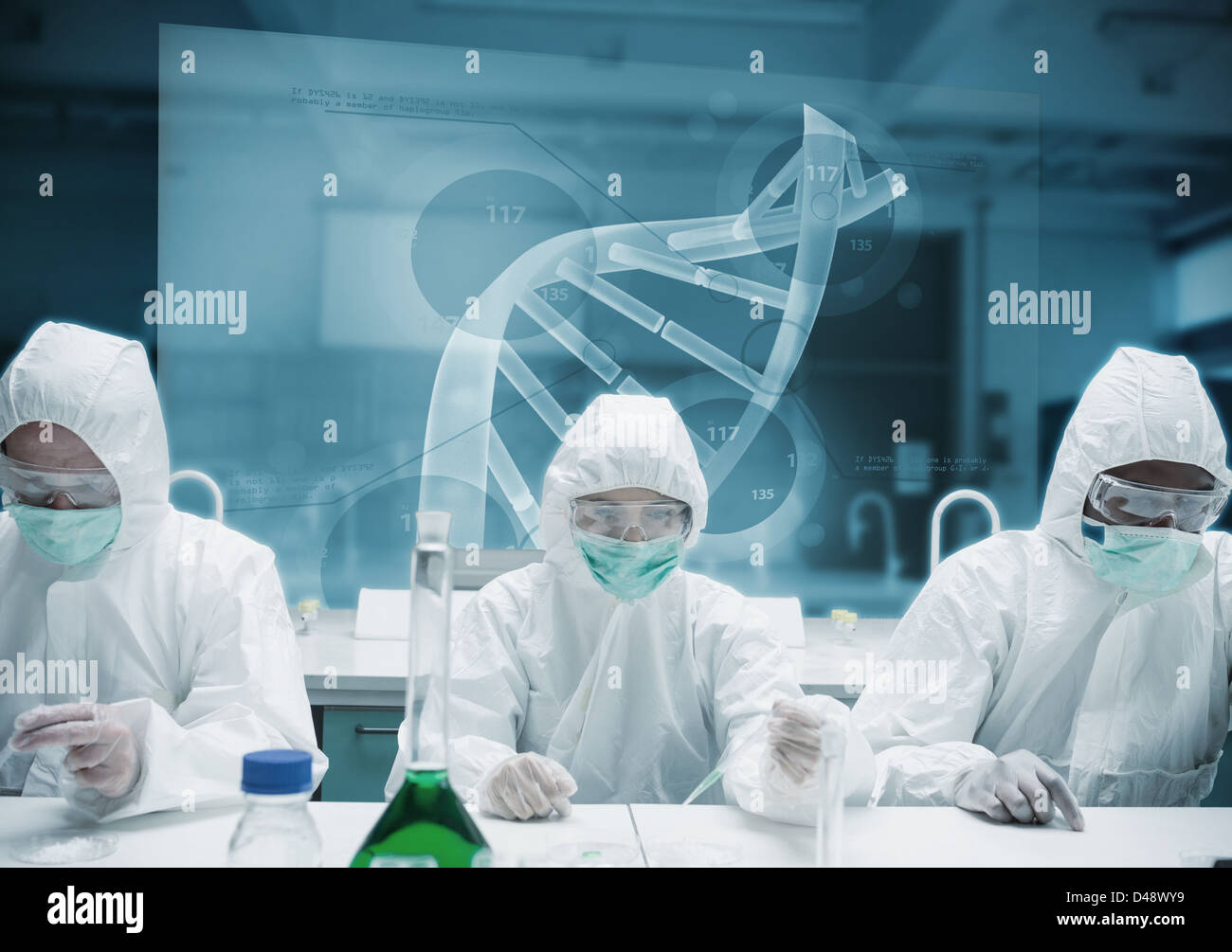 Chemists working in the lab with futuristic interface Stock Photo