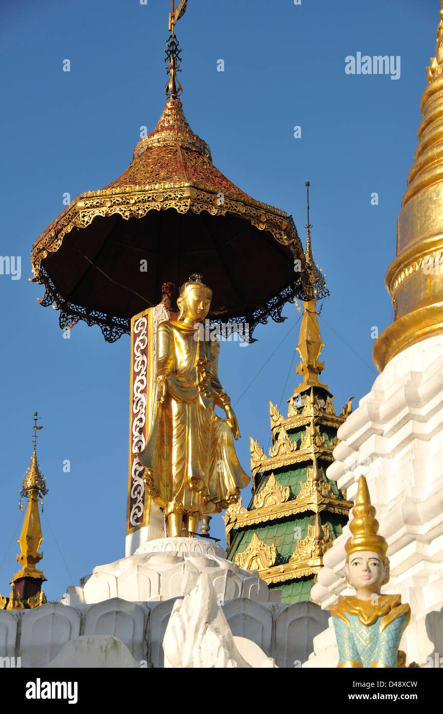 Golden Buddha Statue, Shwedagon Pagoda, Yangon, Myanmar Stock Photo
