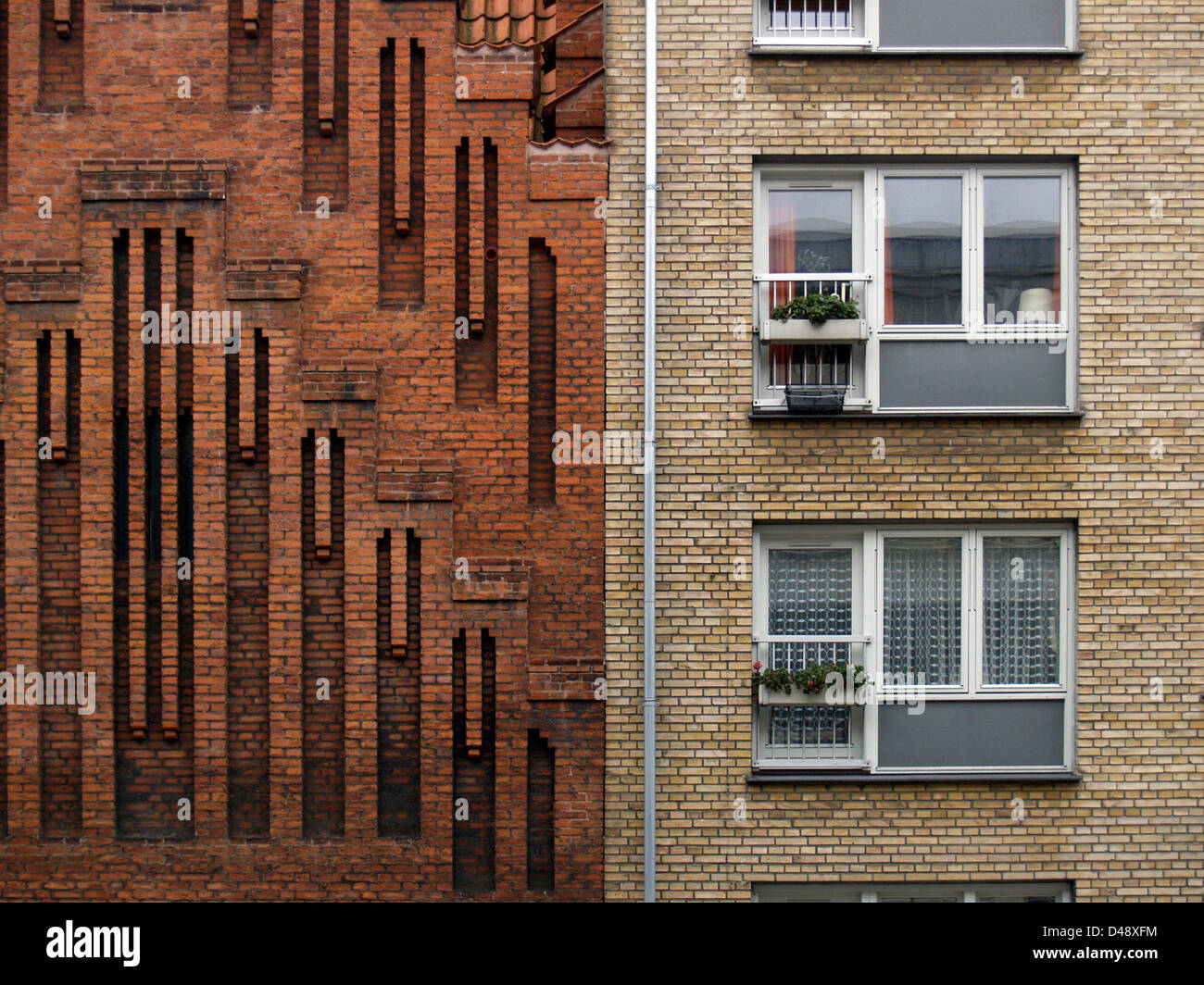 Anna Kirke, designed by P.V. Jensen-Klint, was constructed between 1911 and 1928. The church combines neo-gothic architecture with modernist touches, known for its functionalism, brick construction, and Scandinavian aesthetic, making it a notable landmark in Copenhagen. Stock Photo