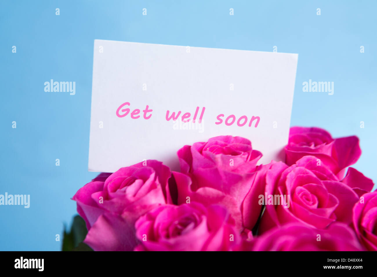 Bouquet of pink roses with get well soon card Stock Photo