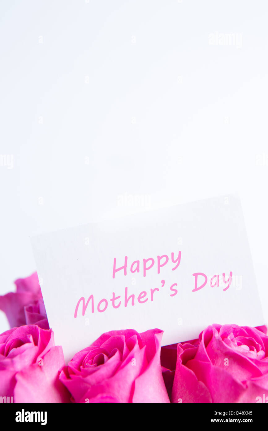 Bouquet of pink roses with happy mothers day card in pink Stock Photo ...