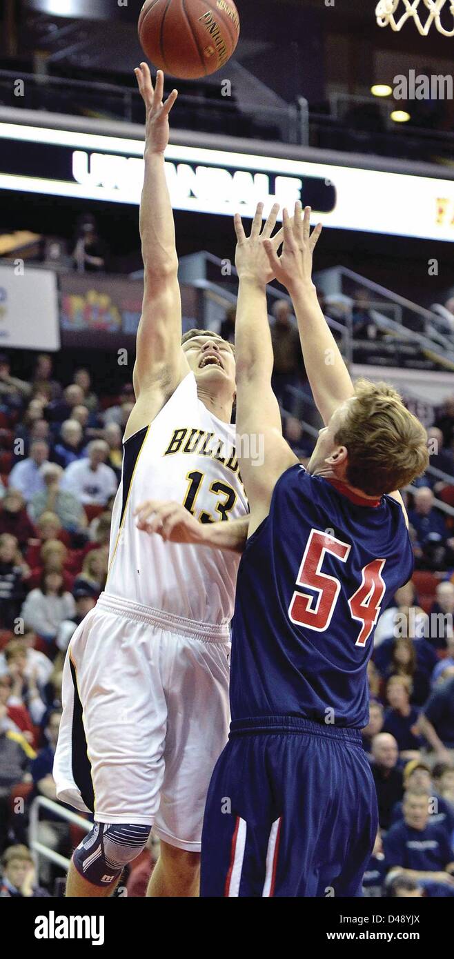 March 6, 2013 - Des Moines, Iowa, U.S. - Bettendorf's Cole Clearman puts up a shot over Urbandale's Nick Noah during a Class 4A quarterfinal on Wednesday, March 6, 2013, at the Wells Fargo Arena in Des Moines. (Credit Image: © Tim Hynds, Sioux City Journal/Quad-City Times/ZUMAPRESS.com) Stock Photo
