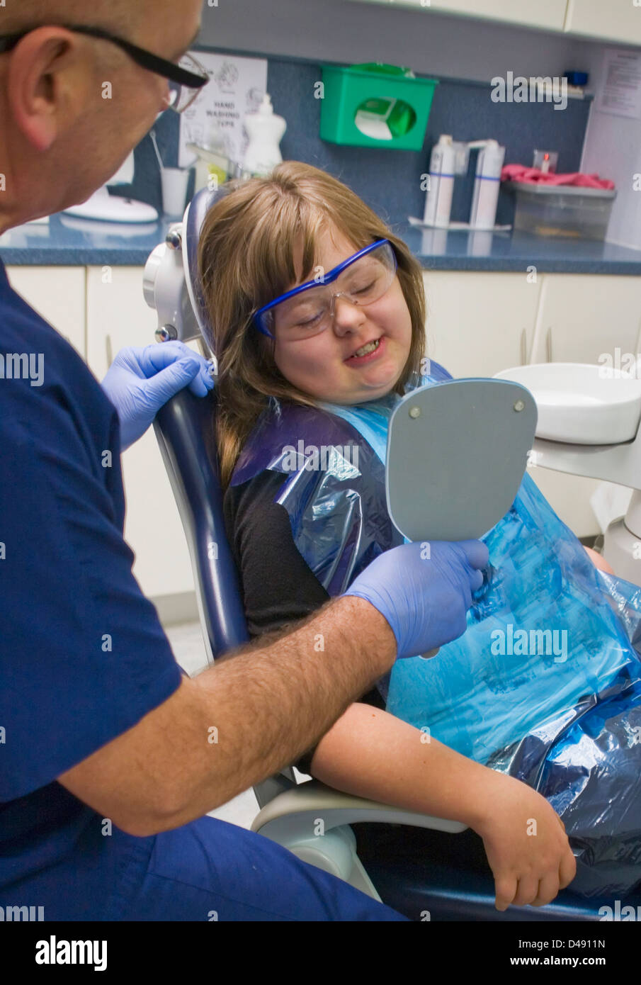 A girl and her dentist during a dental exam;Whitley bay tyne and wear