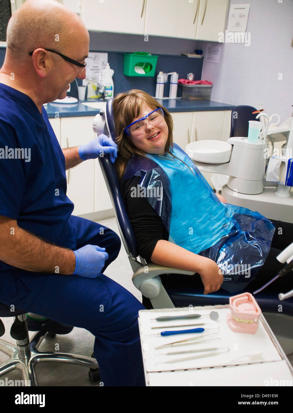 A girl and her dentist during a dental exam;Whitley bay tyne and wear