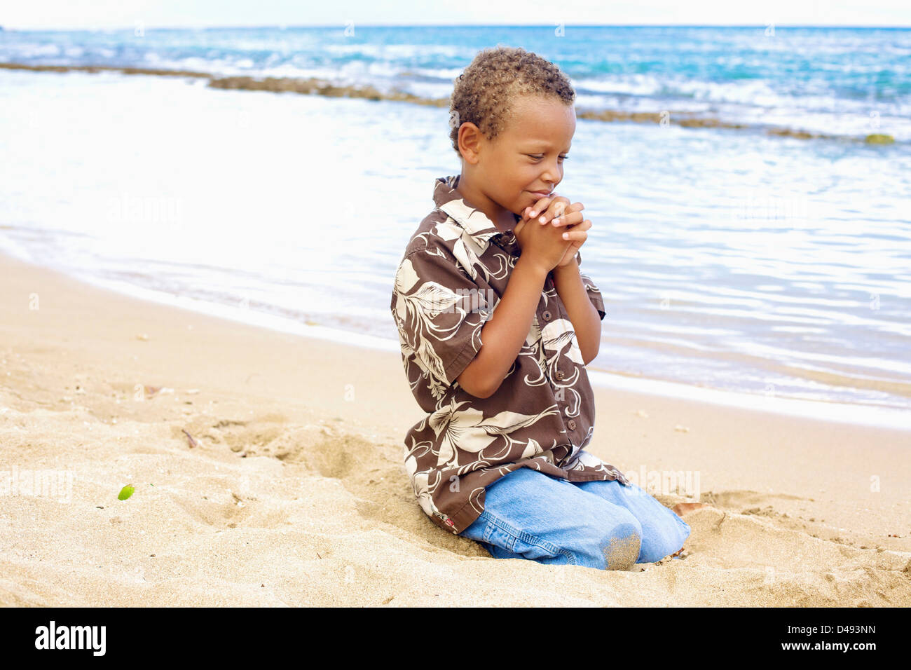 Folded hands kneeling hi-res stock photography and images - Alamy
