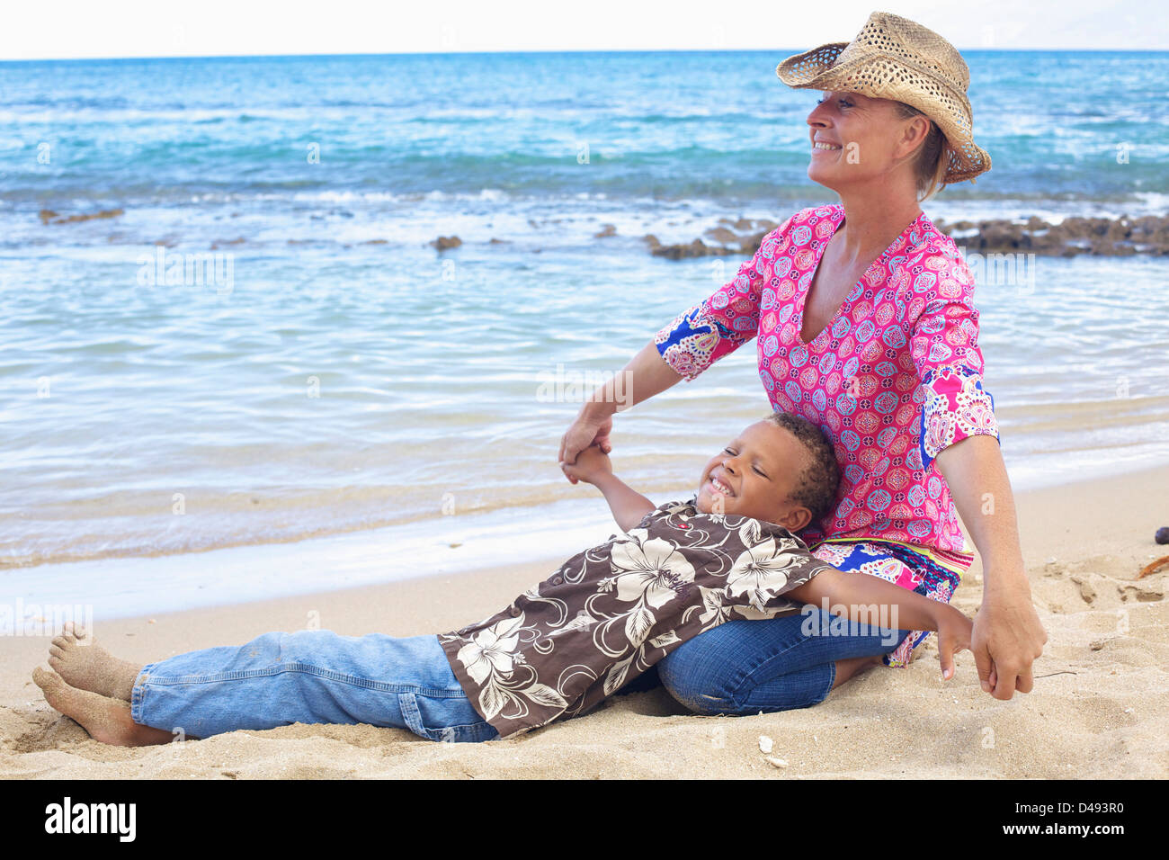Multi racial family at beach hi-res stock photography and images - Alamy