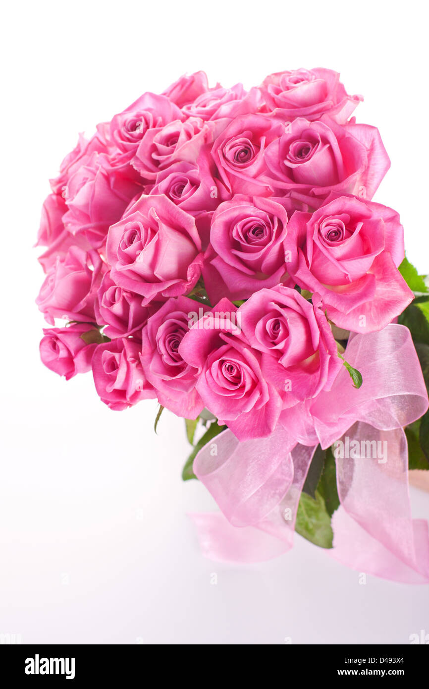 Bouquet of pink roses isolated on white background Stock Photo - Alamy