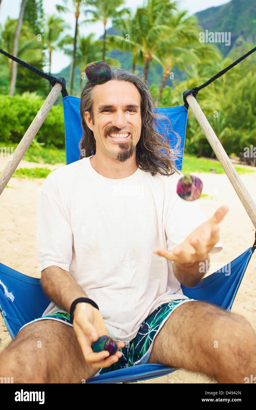 Happy man beach chair hawaii hires stock photography and images Alamy