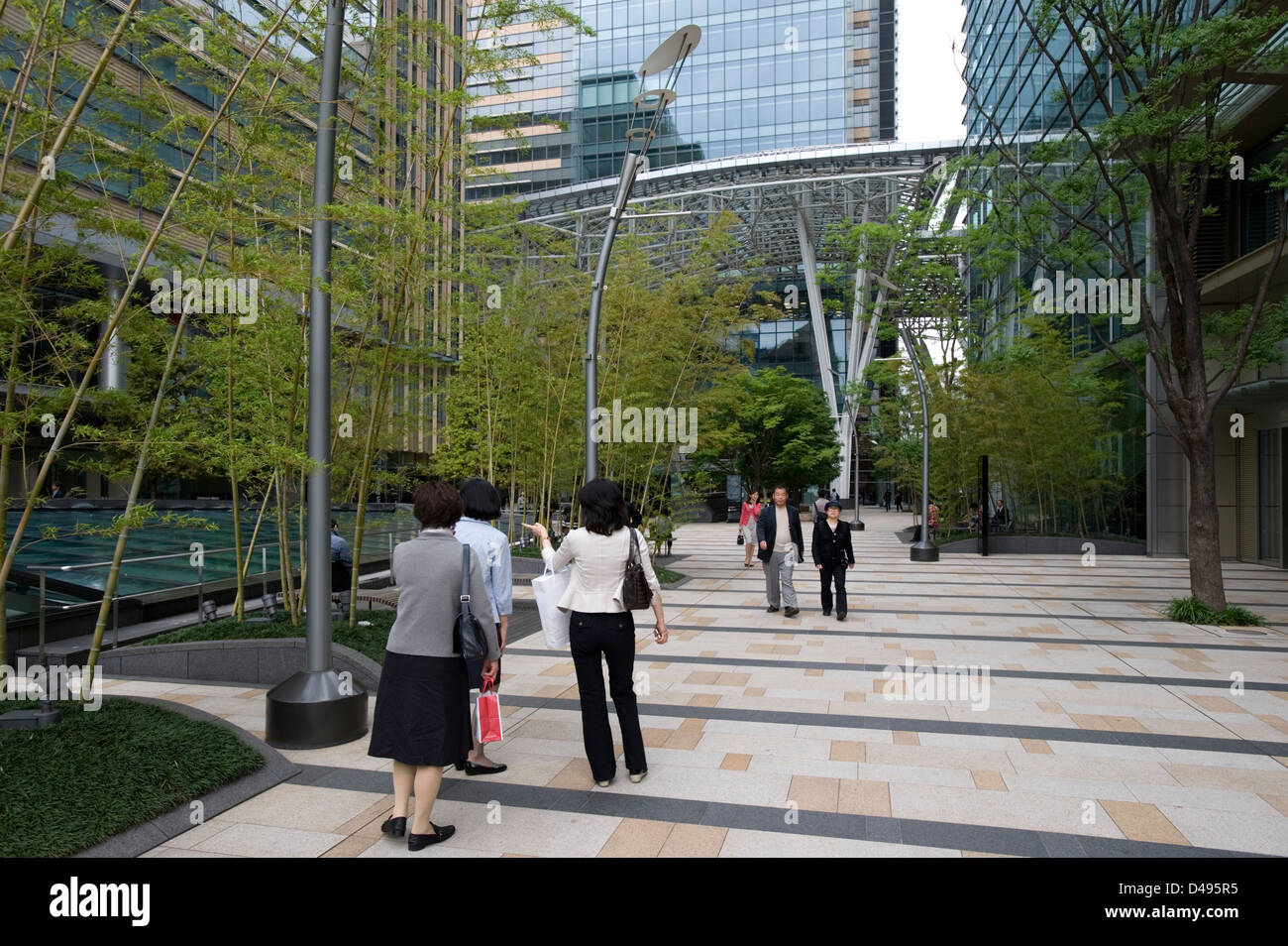 Entry plaza at new, modern Tokyo Midtown shopping, hotel and residential complex in Roppongi, Tokyo, Japan Stock Photo
