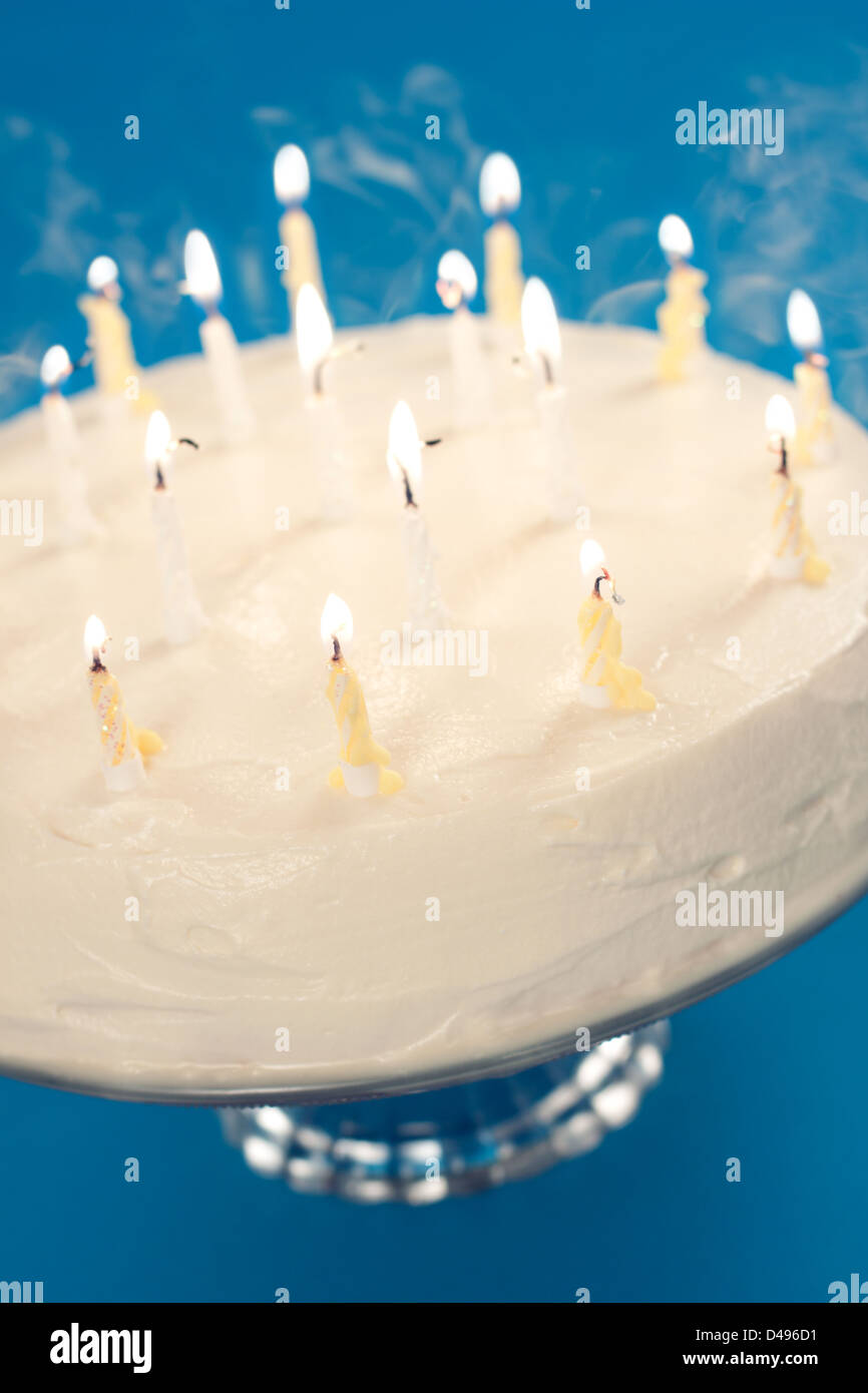 Birthday cake with smoke coming from blown out candles Stock Photo Alamy